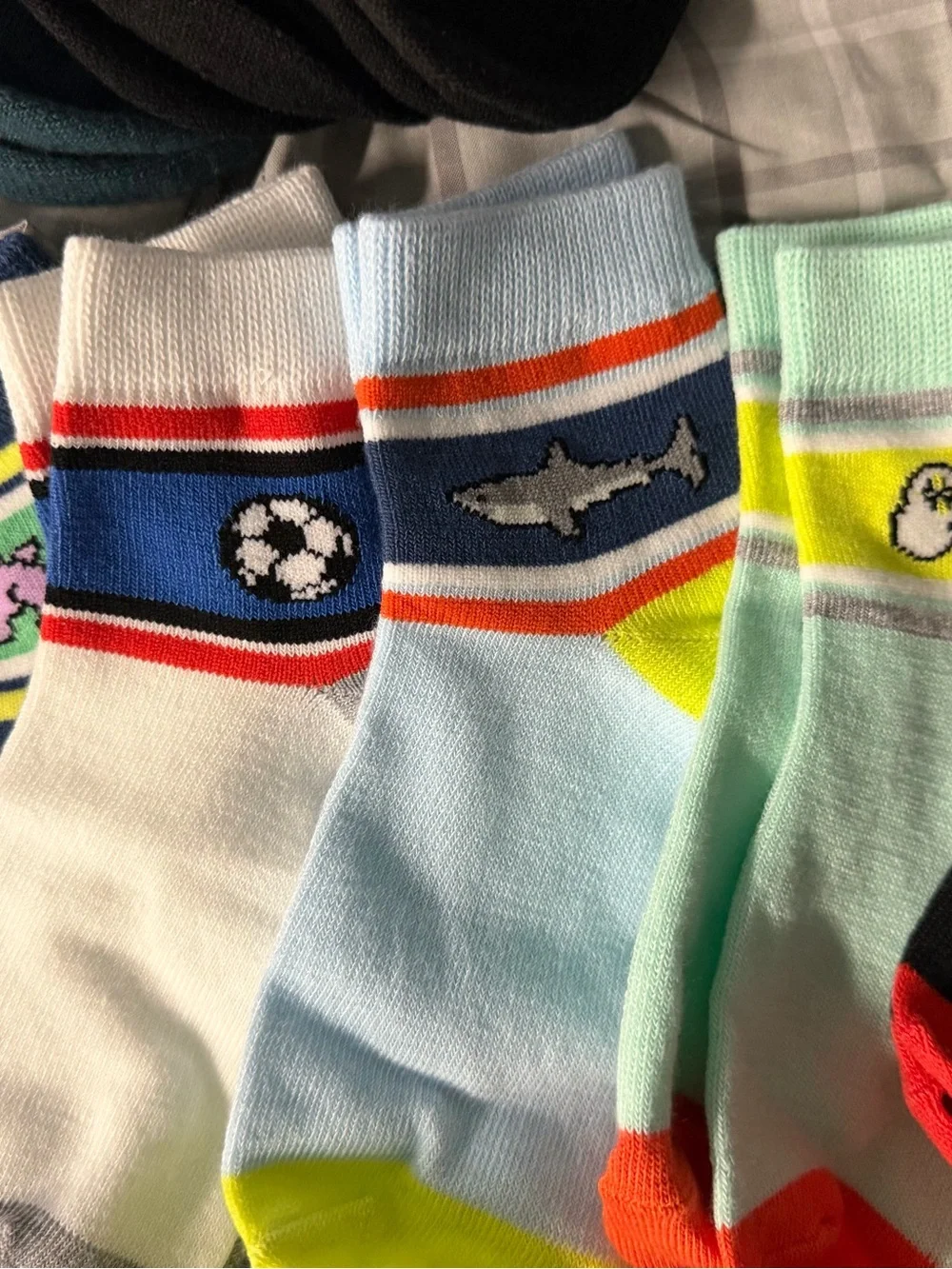 Five pair of boys socks, unbranded open package 6 inches from toe to heel